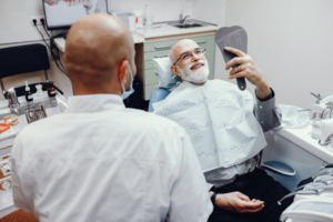 a patient speaking with their dentist 